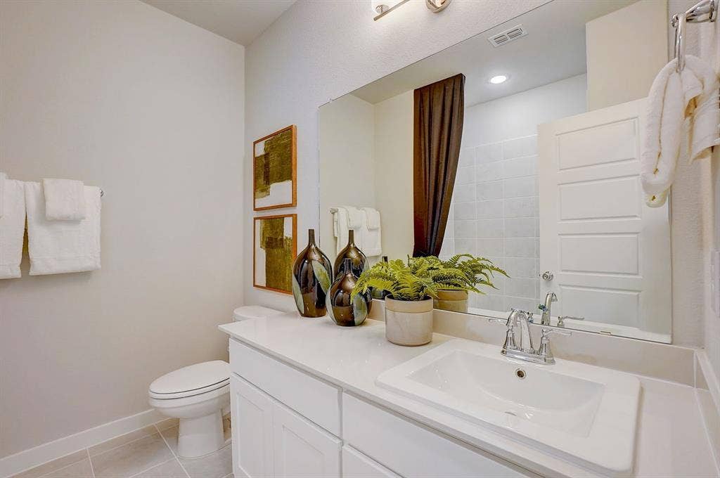 348 Lacy Oak Lane, Waxahachie, TX 75165 Bathroom in the Stanley II home plan - REPRESENTATIVE PHOTO