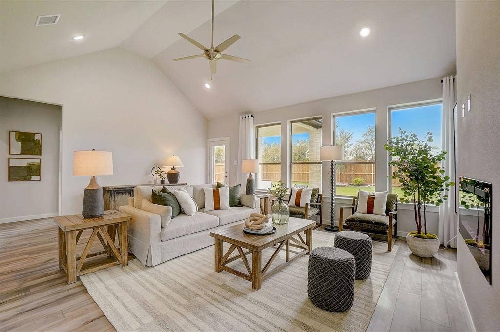 348 Lacy Oak Lane, Waxahachie, TX 75165 Living Room in the Stanley II home plan - REPRESENTATIVE PHOTO