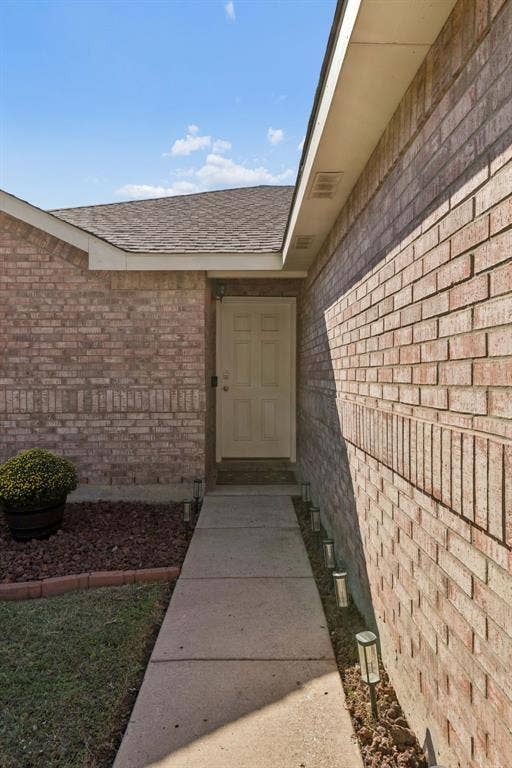 Welcome guests into the home through this inviting outdoor entryway!