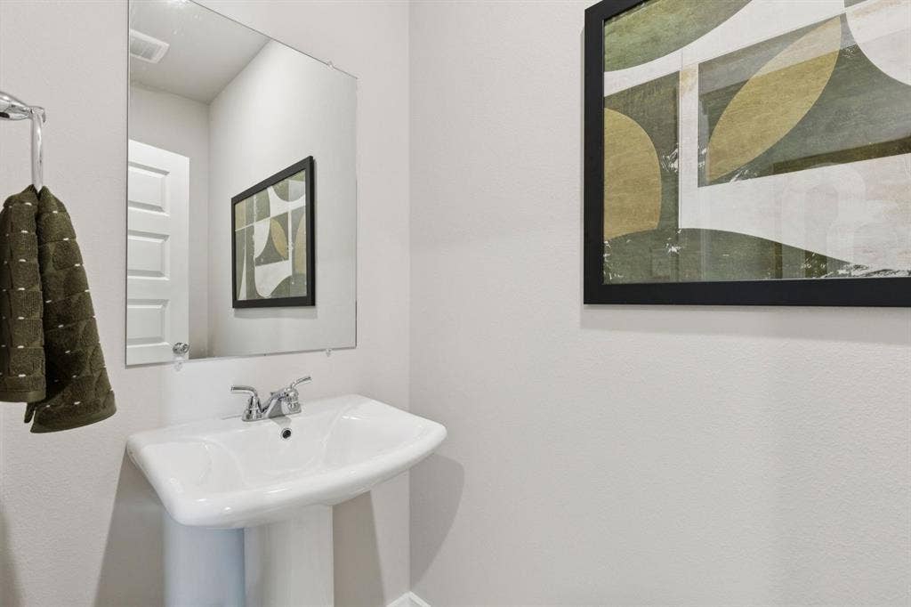 4210 Zoe Lane, Farmersville, TX 75442 Bathroom in the Magnolia home plan – REPRESENTATIVE PHOTO
