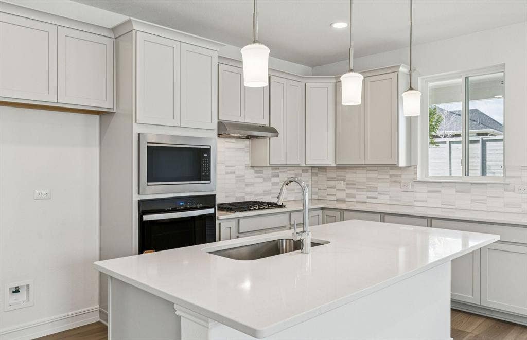 3032 Oakdale Drive, Celina, TX 75009 *Floorplan representation, not actual home - Spacious kitchen with eat-in bartop island