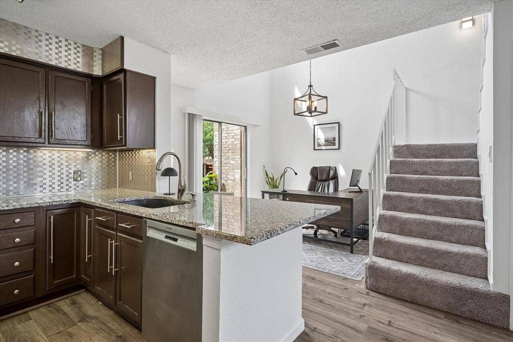 Open floorplan with kitchen opening to study/dining room area makes this a comfortable place to call home!