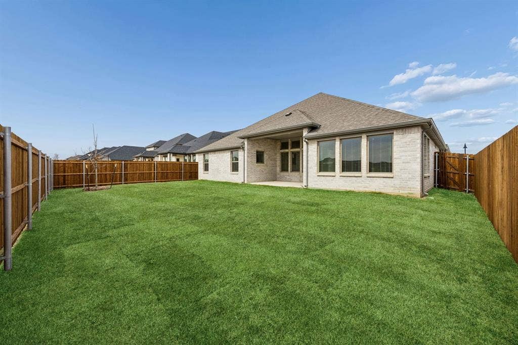 1247 Treasure Woods Lane, Lavon, TX 75166 Covered Patio in the Gilmour II home plan – REPRESENTATIVE PHOTO