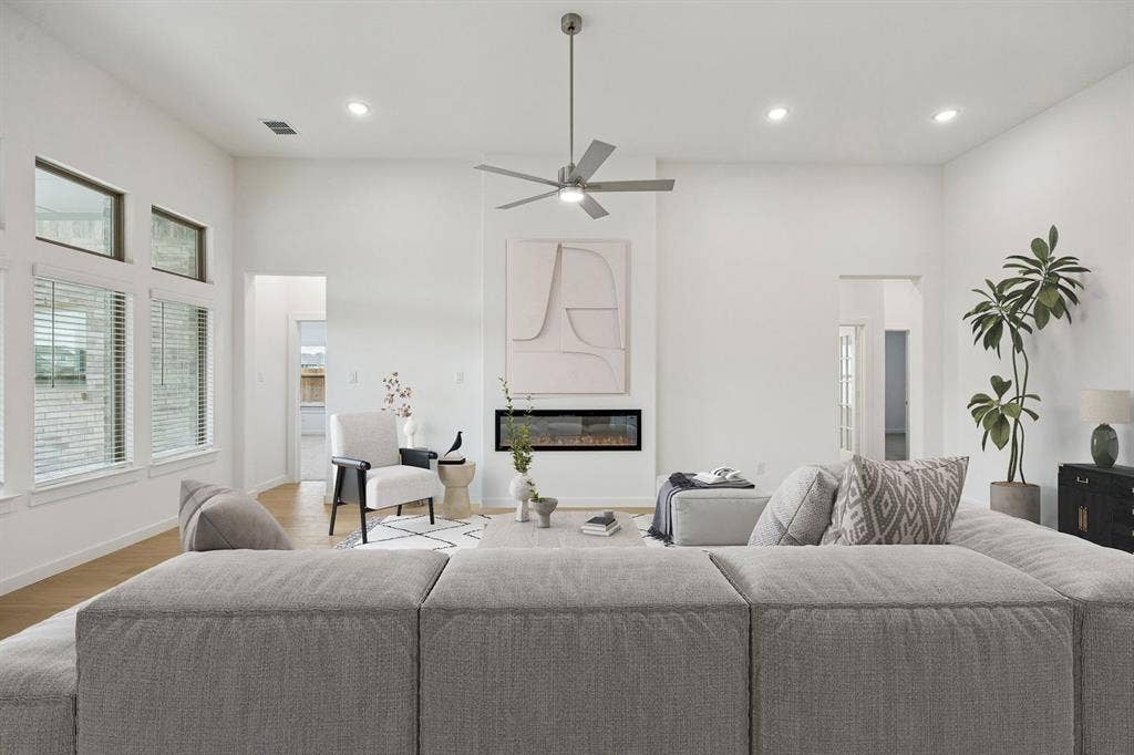 1247 Treasure Woods Lane, Lavon, TX 75166 Living Room in the Gilmour II home plan – REPRESENTATIVE PHOTO
