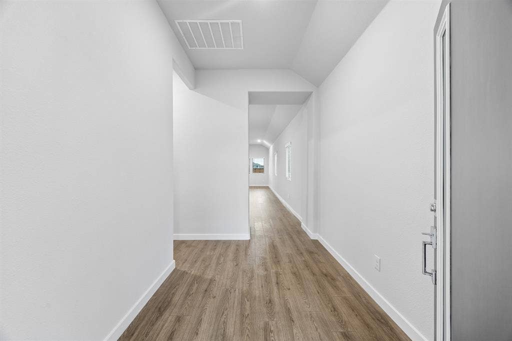 1121 Bridgewalk Drive, McKinney, TX 75071 Entryway in the Cedar home plan – REPRESENTATIVE PHOTO