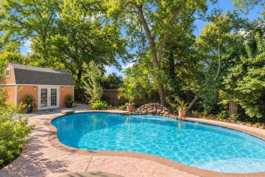 Sunlit Backyard Pool Oasis