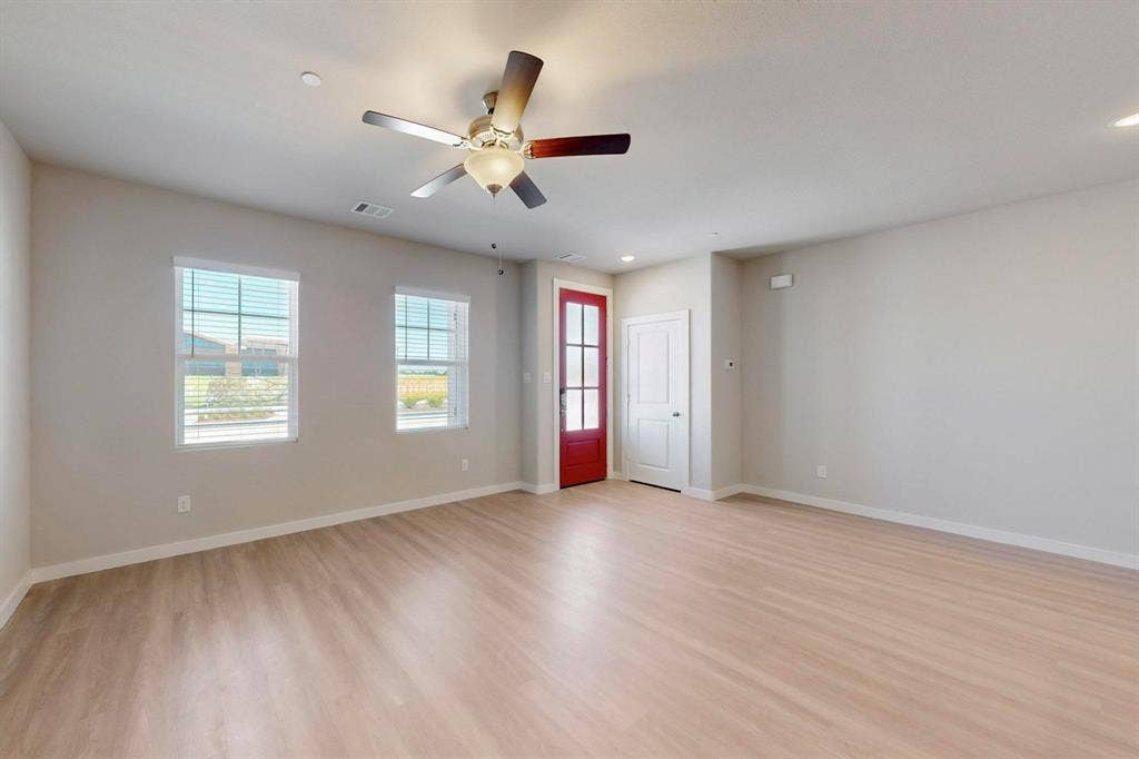 1424 Starlight Trail, Mesquite, TX 75181 Unfurnished room featuring light wood-style flooring, recessed lighting, and a ceiling fan