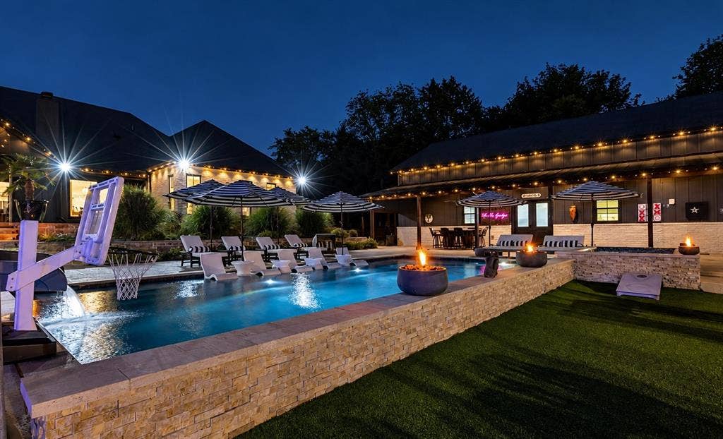 104 Oakbend Trail, Mabank, TX 75147 The pool, covered entertaining areas, and outdoor kitchen create a wonderful setting for gatherings with family and friends.