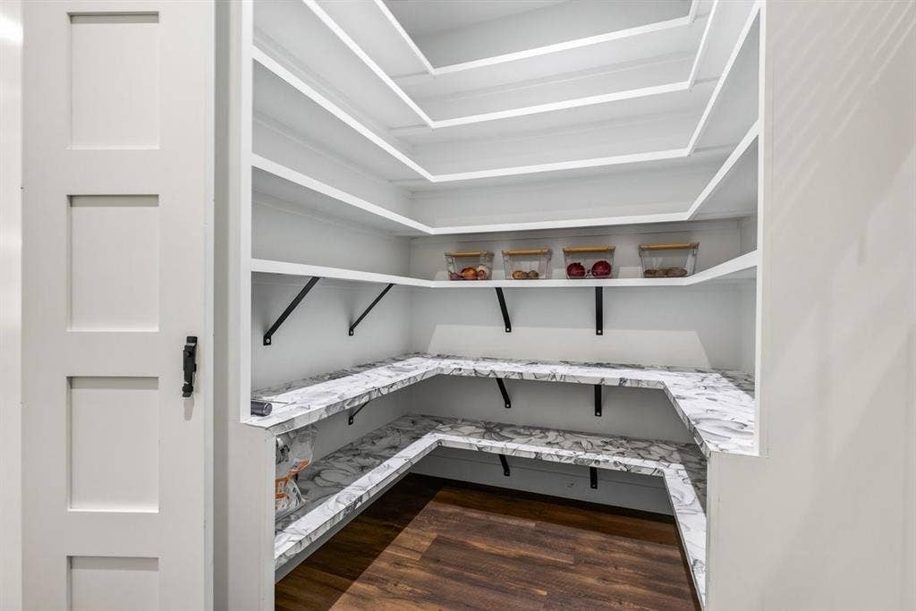 104 Oakbend Trail, Mabank, TX 75147 Walk-in pantry offering extensive custom shelving and countertop space for additional storage. Main Residence.