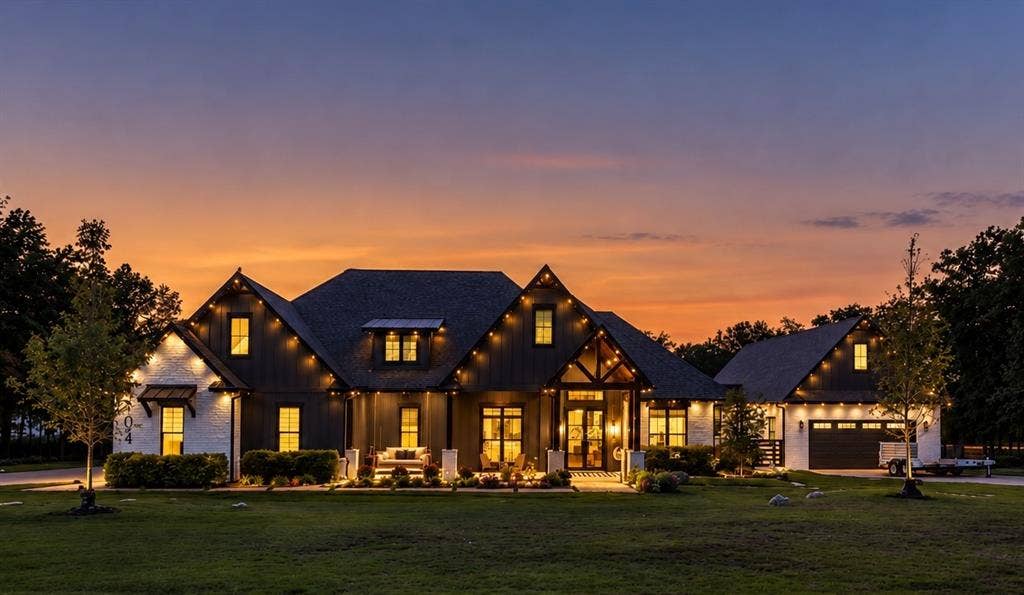 104 Oakbend Trail, Mabank, TX 75147 Beautiful twilight view of the main residence, showcasing the exterior architecture and landscape lighting.