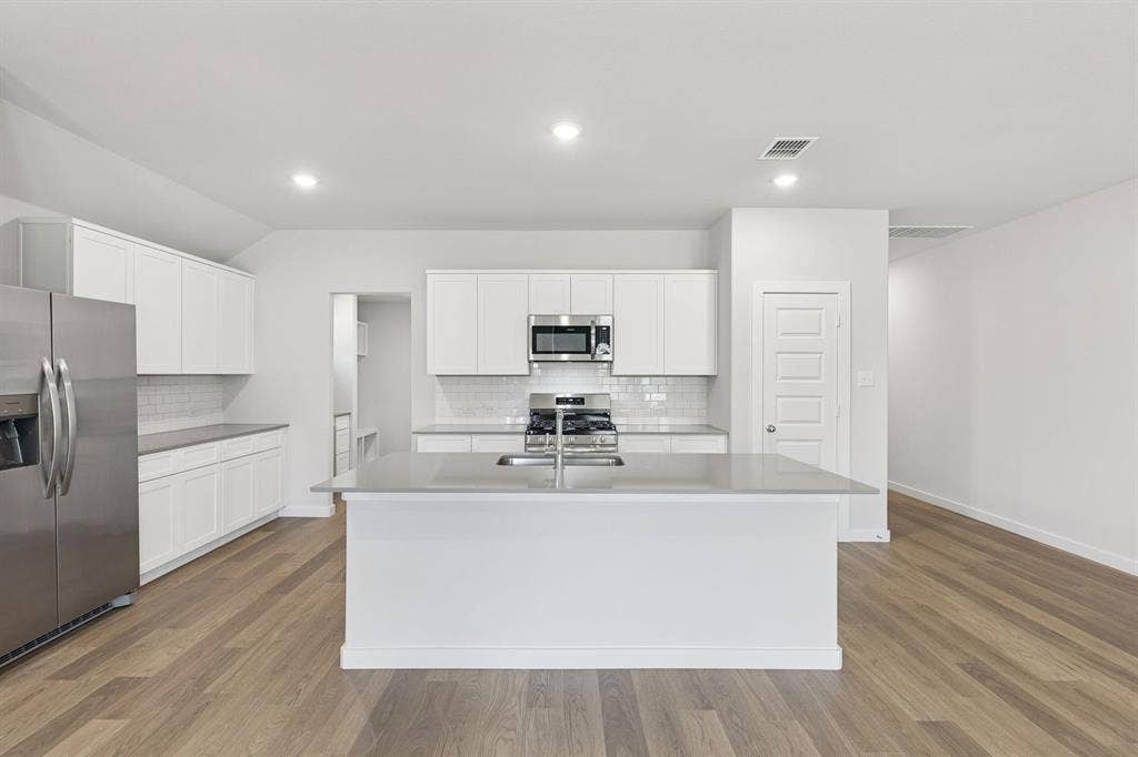 4107 Fork Drive, Farmersville, TX 75442 Kitchen in the Harrison home plan – REPRESENTATIVE PHOTO