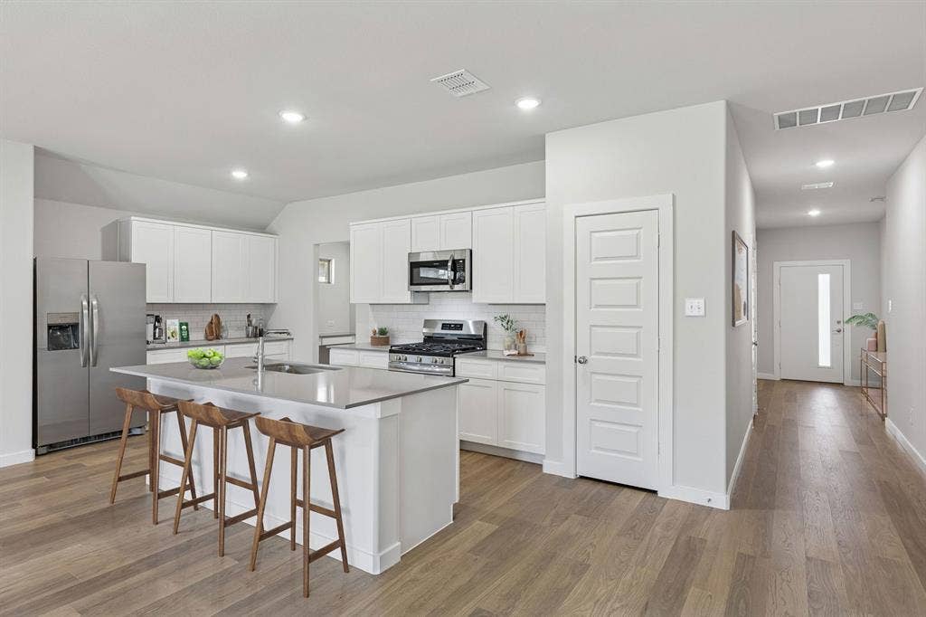 4107 Fork Drive, Farmersville, TX 75442 Kitchen in the Harrison home plan – REPRESENTATIVE PHOTO