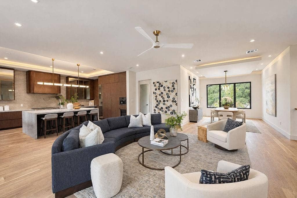 Host unforgettable parties where conversation flows naturally from the dining table to the fireside seating area