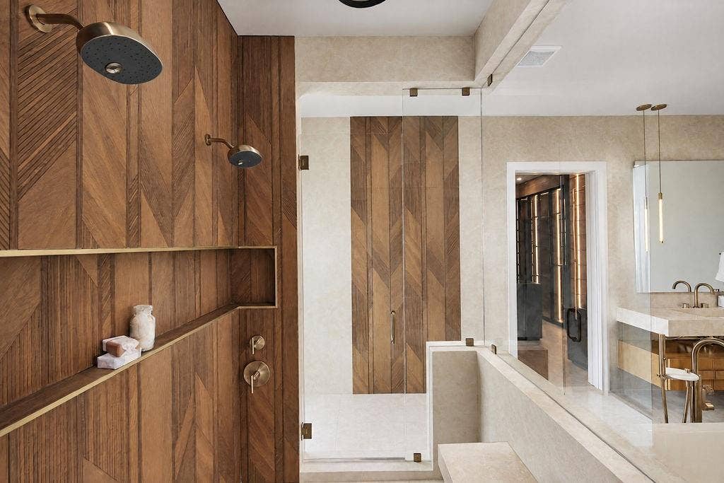 Step into a spa-level routine with dual showerheads and Porcelanosa finishes