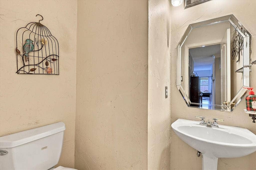 1906 Chapel Cove, Rowlett, TX 75088 Downstairs powder room perfect for guests.