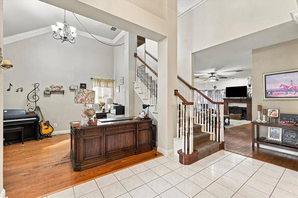 1906 Chapel Cove, Rowlett, TX 75088 Easy access to the upstairs from the entry way and great flow into the living room.