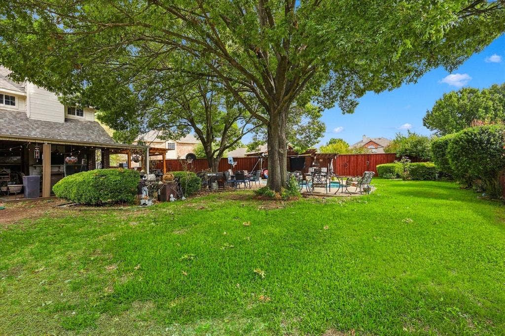 1906 Chapel Cove, Rowlett, TX 75088 All this space left for play alongside the pool, hot tub, and patio!