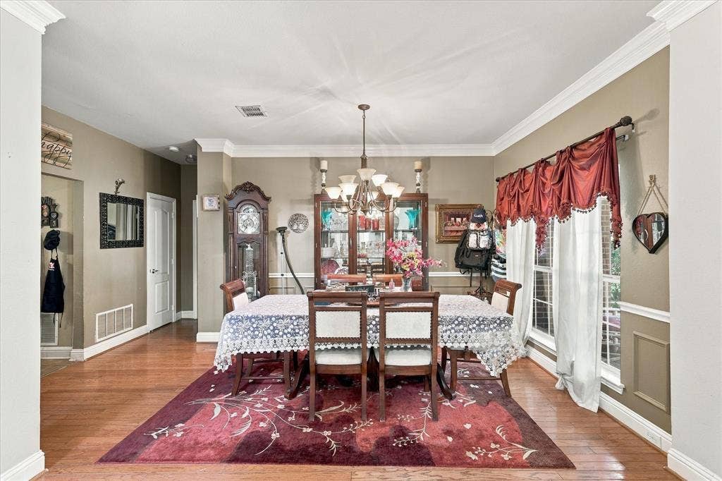 1906 Chapel Cove, Rowlett, TX 75088 Formal dining room alongside entryway leading into the kitchen.