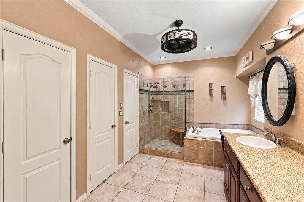 1906 Chapel Cove, Rowlett, TX 75088 Primary bathroom with linen closet, water closet for toilet and first of two closets!
