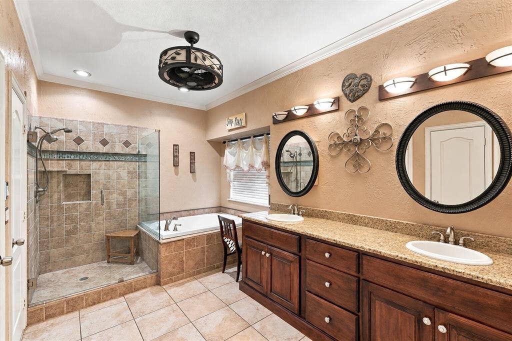 1906 Chapel Cove, Rowlett, TX 75088 Primary Bathroom with walk-in shower, soaking tub, double vanity countertop.