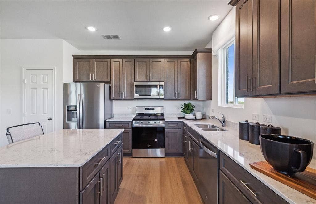 1211 Briar Street, Princeton, TX 75407 *Model Representation - Abundant cabinet space in kitchen