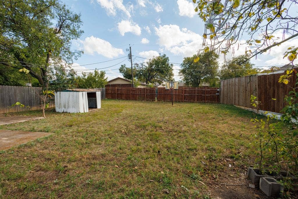 124 Rio Rita Drive, Garland, TX 75040 Large fenced backyard with shed