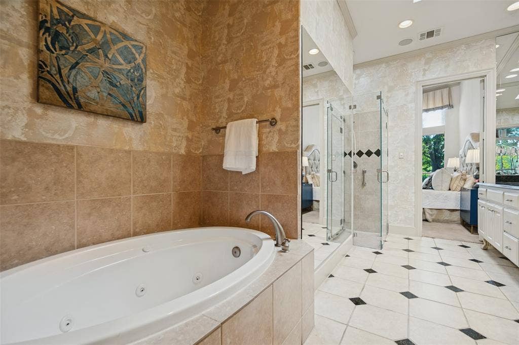 12050 Lueders Lane, Dallas, TX 75230 Primary bathroom with tub and shower
