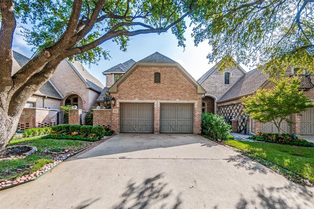 12050 Lueders Lane, Dallas, TX 75230 Front of house and garage