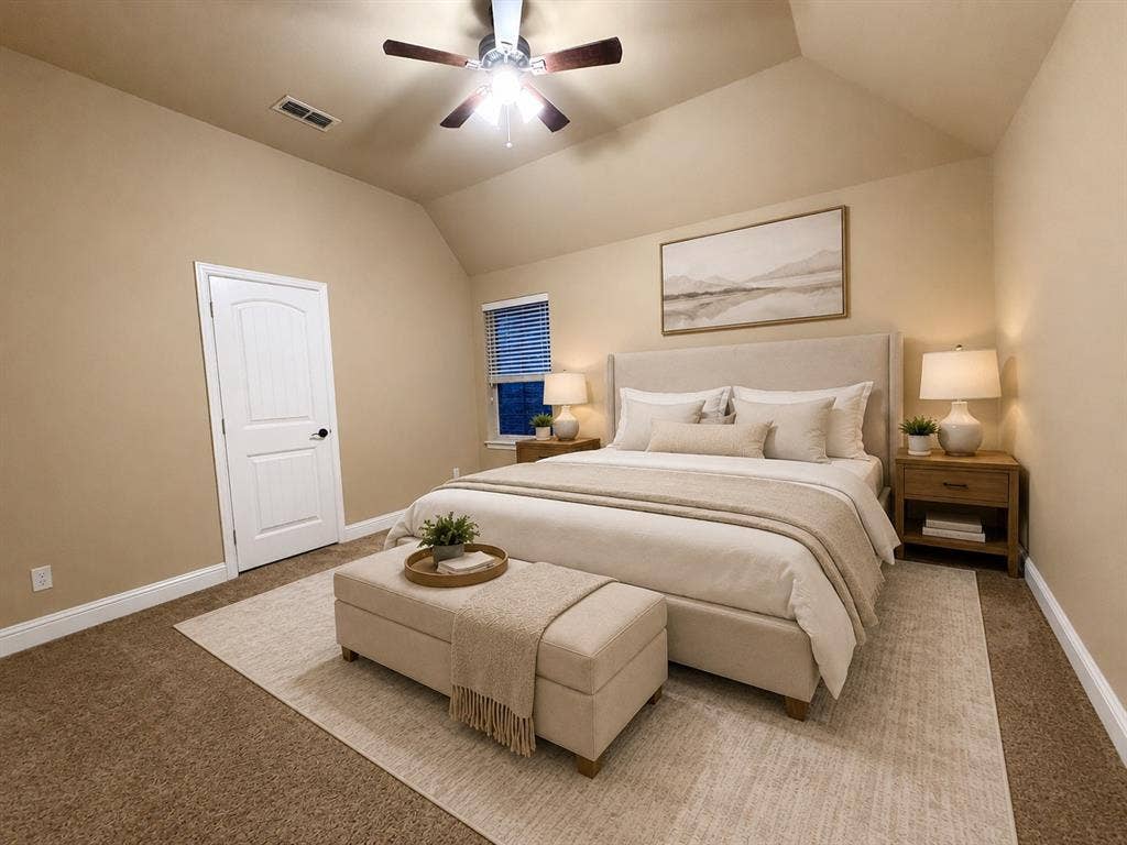 13812 Nash Lane, Frisco, TX 75035 Carpeted sleeping area with a vaulted ceiling and a ceiling fan