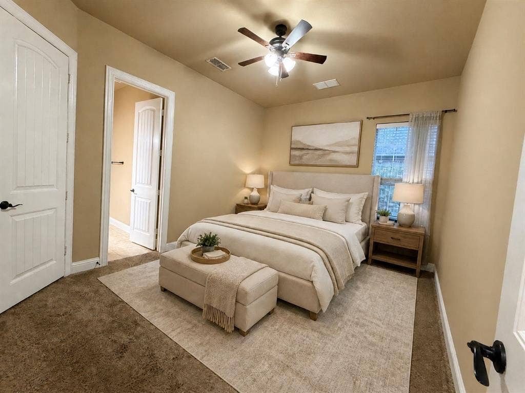 13812 Nash Lane, Frisco, TX 75035 Carpeted bedroom featuring a ceiling fan with integrated lighting, a window with blinds, and two paneled doors with black hardware