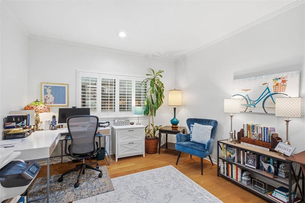 4115 Brooktree Lane, Dallas, TX 75287 Third bedroom shines as a home office—work from home with plantation shutters and all-day natural light.