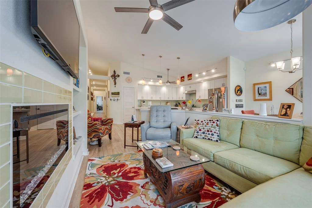 1031 Grandview Avenue, Dallas, TX 75223 Enjoy your cozy living area with the electric fireplace