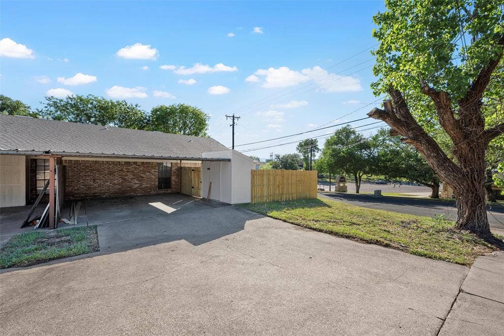 300 Mill Creek Circle, #4, Waco, TX 76712 Covered parking, extra parking, and storage closet and fenced yard.