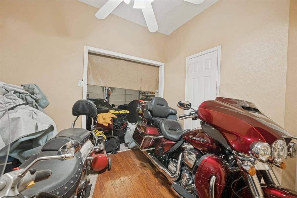 bedroom being used as cycke storage, seller will replace wall to garage
