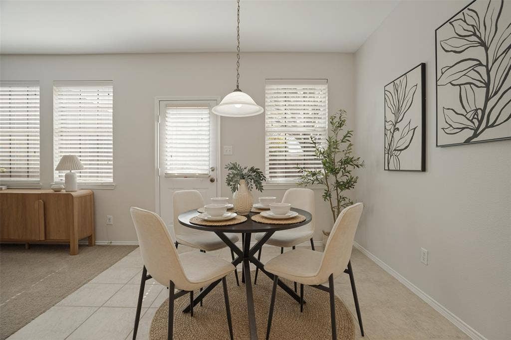 Breakfast nook with natural light and backyard access