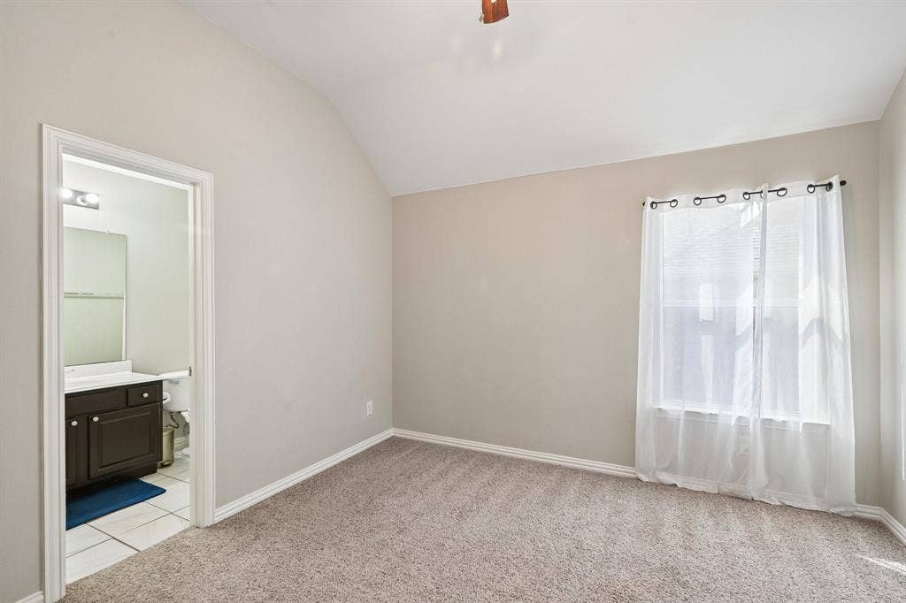10005 Fairway Vista Drive, Rowlett, TX 75089 Upstairs Bedroom with ensuite bathroom