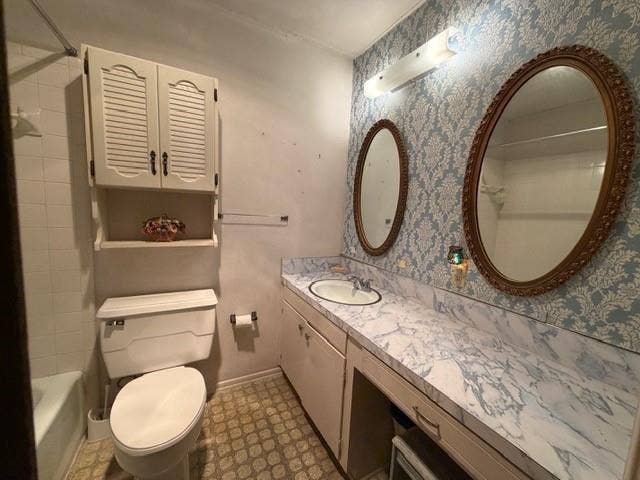Bathroom featuring vanity with patterned countertop, wall-mounted louvered storage cabinet, two oval wall mirrors, and a tile-surround shower
