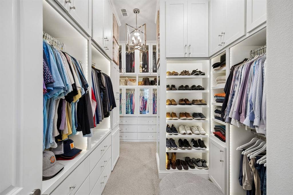 641 Country Brook Lane, Prosper, TX 75078 Custom designed and crafted primary closet. A show stopper for sure.