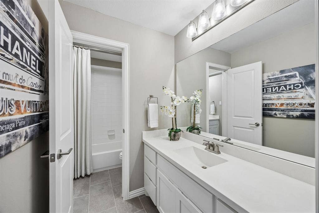 641 Country Brook Lane, Prosper, TX 75078 Jack and Jill bath located between bedroom three and four.