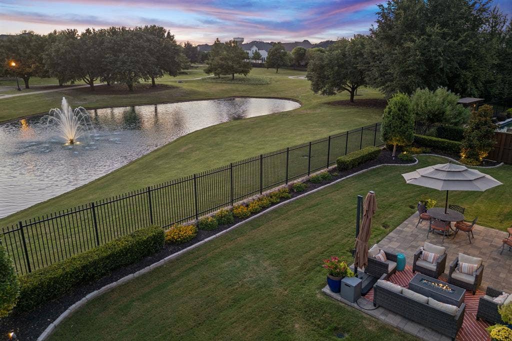 641 Country Brook Lane, Prosper, TX 75078 Stunning view up the greenbelt across the lake with the fountain!