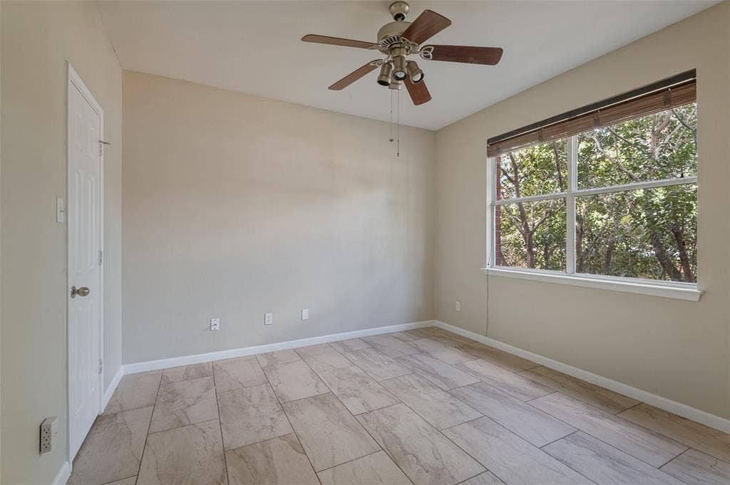 Downstairs bedroom or second office space.