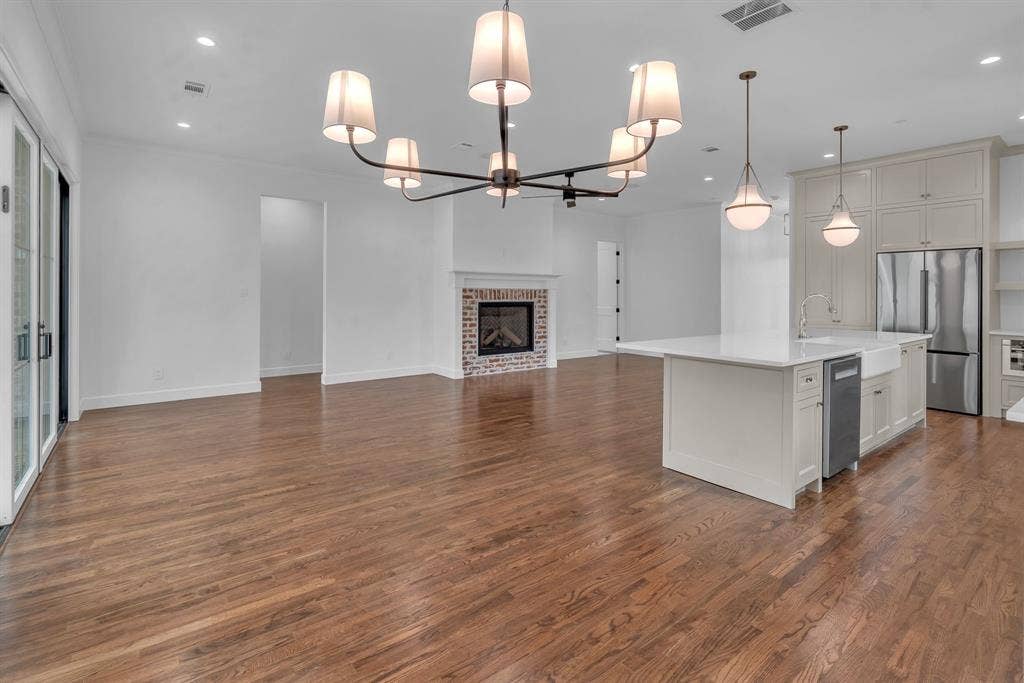 Wide open living area with gas fireplace