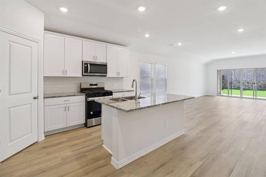 1753 Onion Creek Place, Crandall, TX 75114 Photo is not of the actual home, but is an inspirational photo of builder’s model home and may depict options, furnishings, and/or decorator features that are not included.