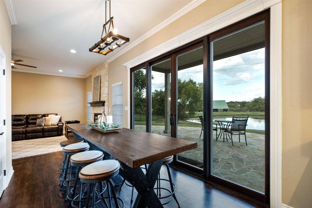 Sliding doors open directly to the covered patio, extending your dining and hosting footprint.