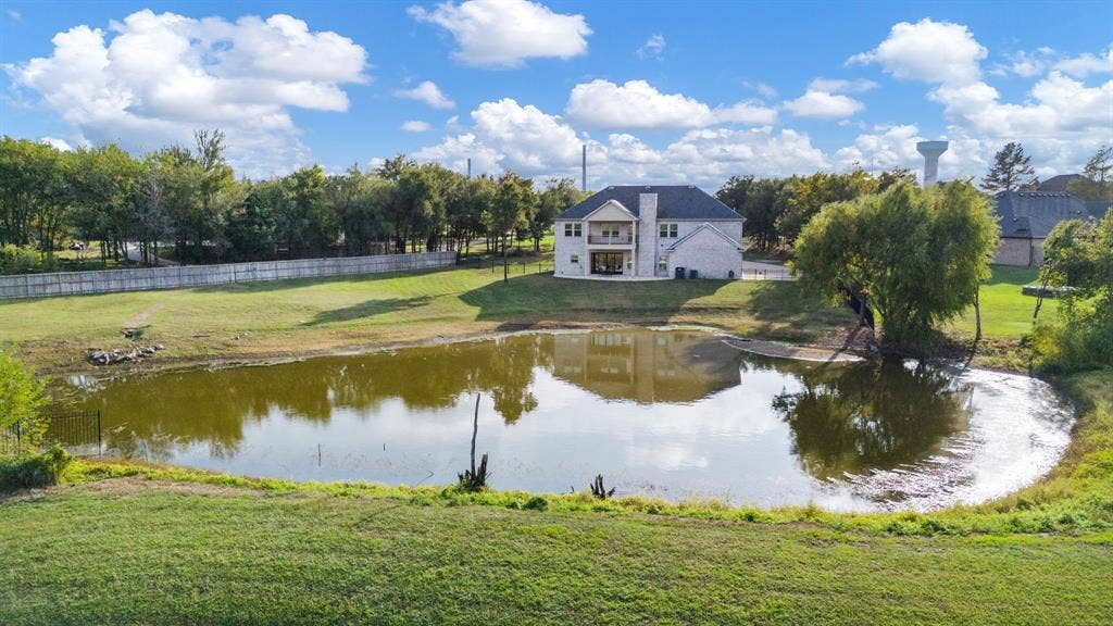 Property line is located in the middle of the pond per survey.