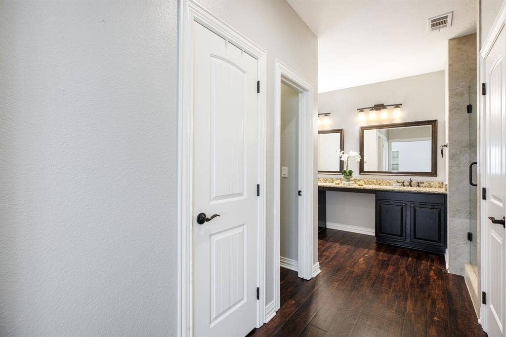 Double sinks and double walk-in closets.