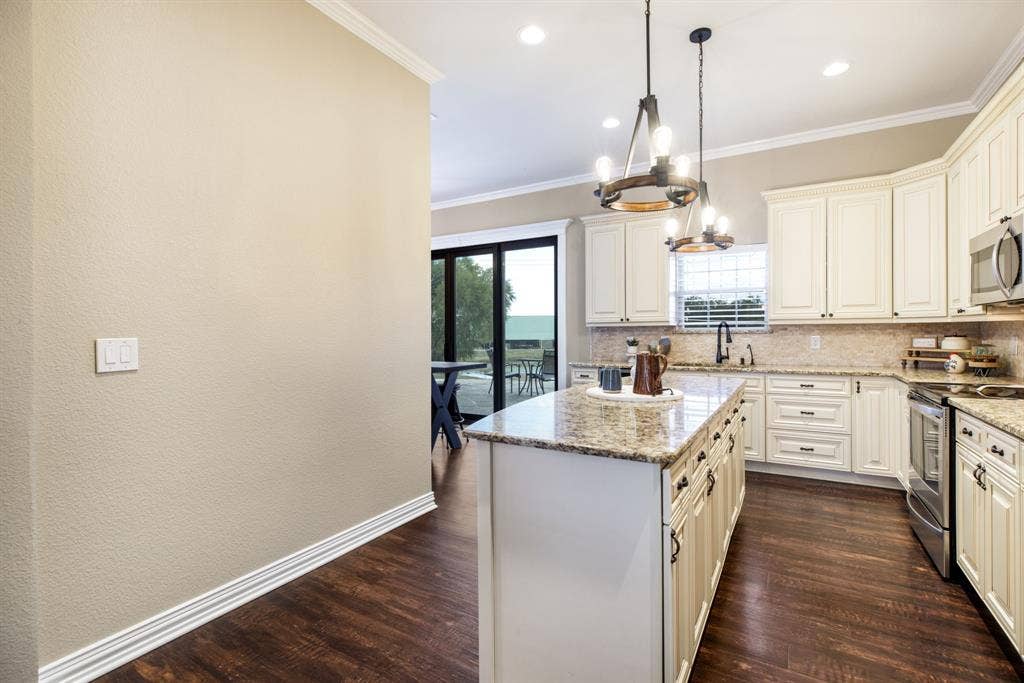 Granite countertops and custom cabinetry.