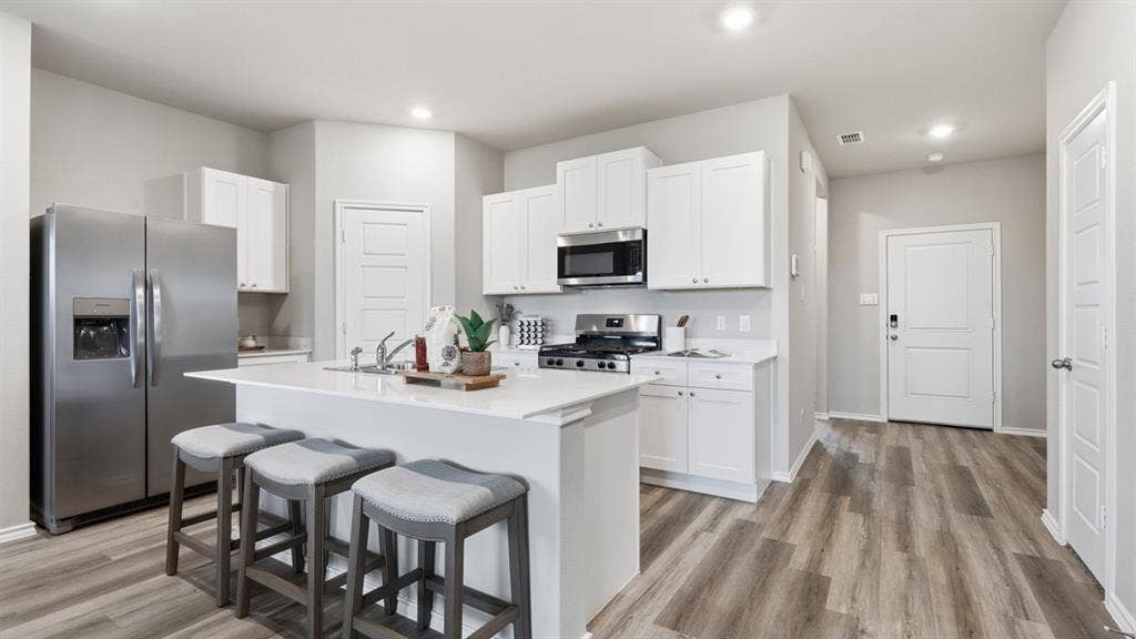 Kitchen - All Home and community information, including pricing, included features, terms, availability and amenities, are subject to change at any time without notice or obligation. All Drawings, pictures, photographs, video, square footages, floor plans, elevations, features, colors and sizes are approximate for illustration purposes only and will vary from the homes as built.
