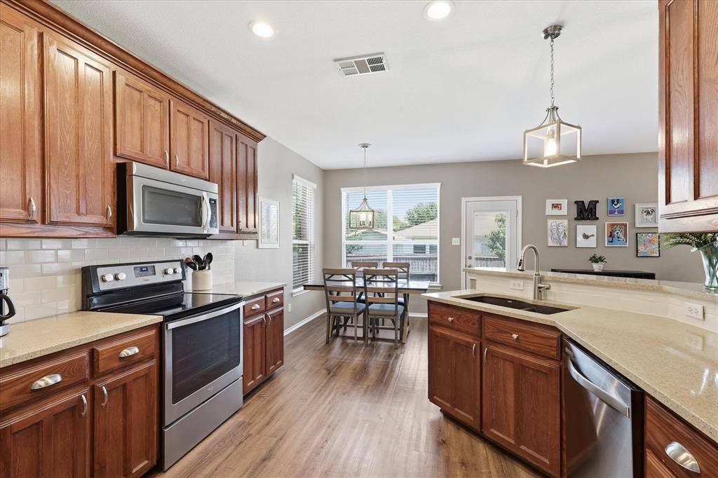 Kitchen with stainless steel appliances