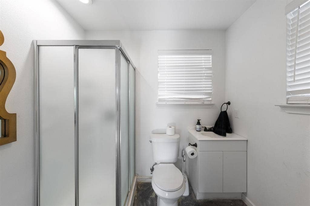 Bathroom w shower in the guest quarters off of the pool area.